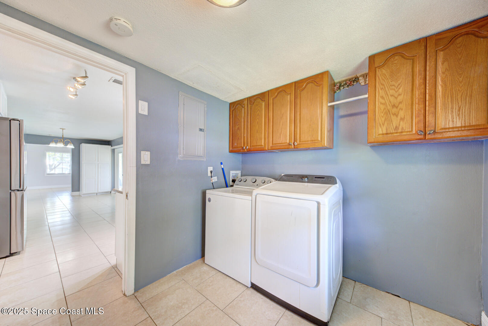 949 Brunswick Lane Rockledge, FL 32955 - Photo 23 of 43 a utility room with dryer and washer