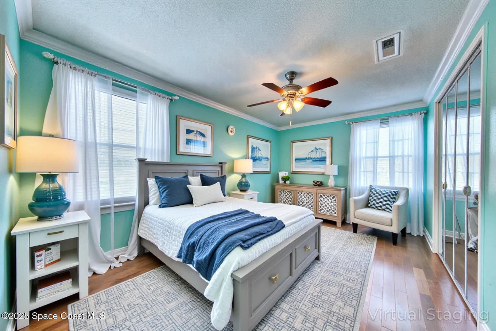 949 Brunswick Lane Rockledge, FL 32955 - Photo 30 of 43 a bedroom with a bed a couch and dresser