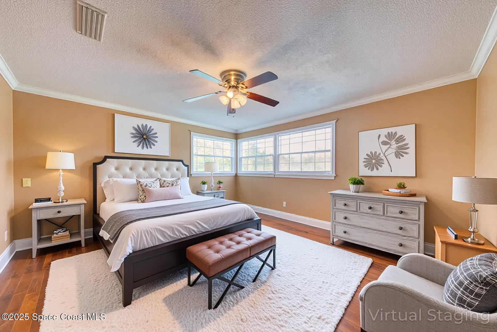 949 Brunswick Lane Rockledge, FL 32955 - Photo 32 of 43 a bedroom with a bed and a dresser in it