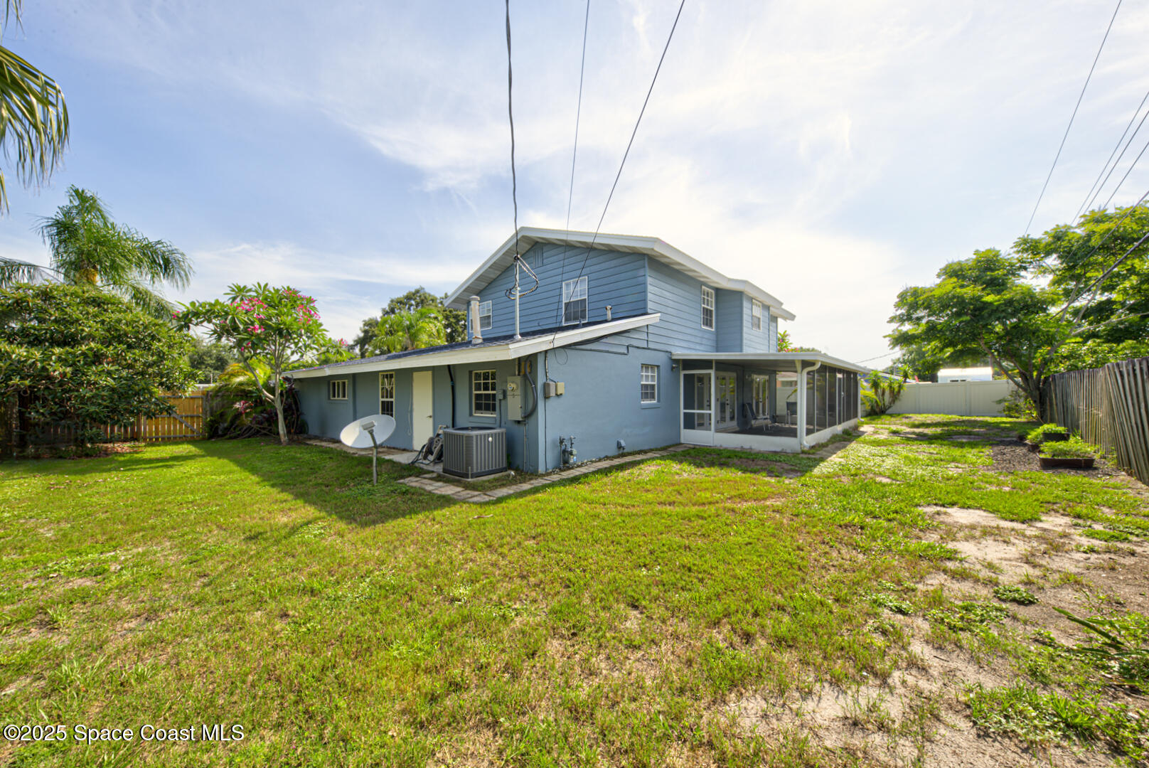 949 Brunswick Lane Rockledge, FL 32955 - Photo 41 of 43 a house view with a garden space