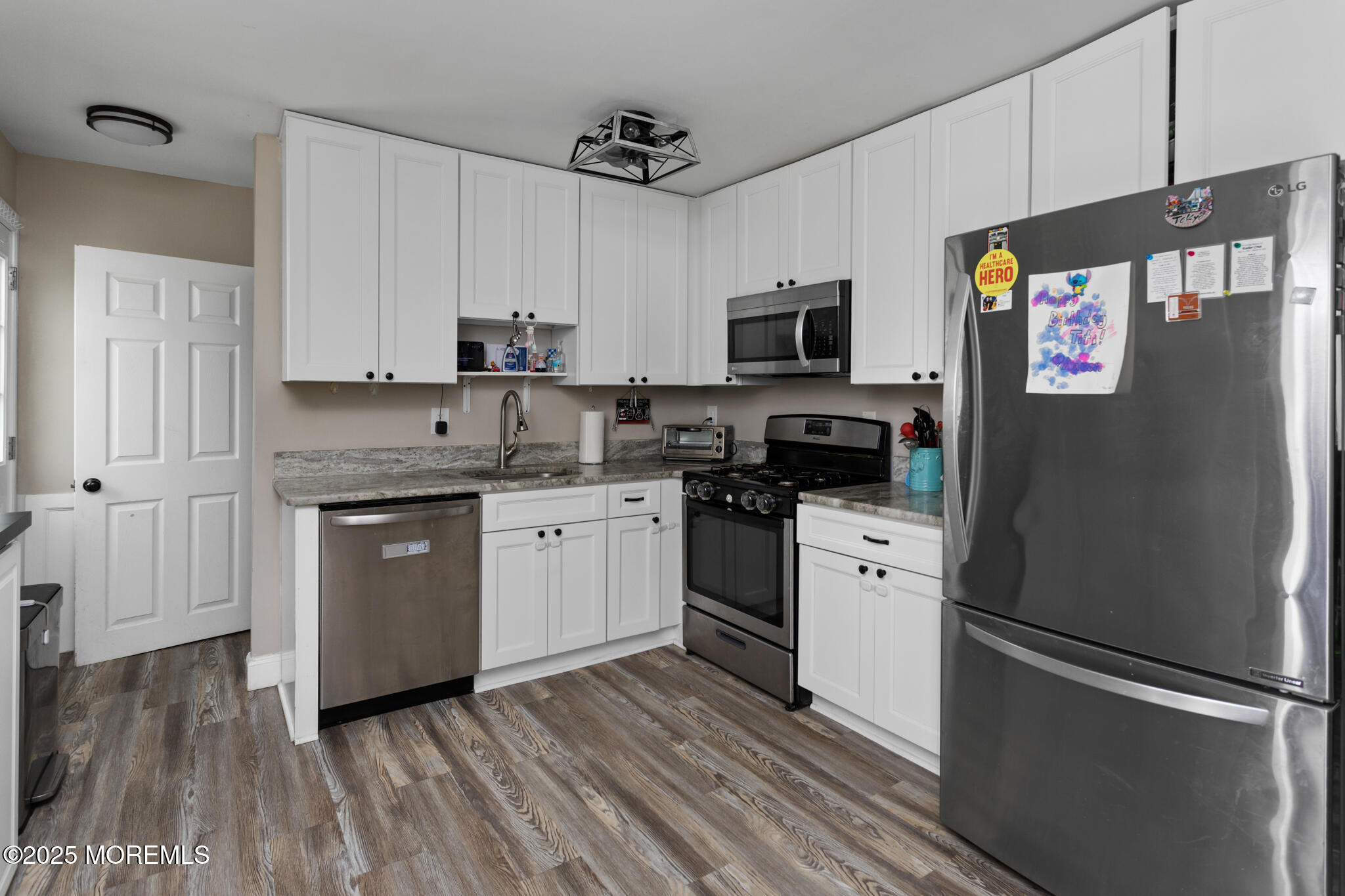 444 Pennington Drive Westampton, NJ 08060 - Photo 12 of 25 a kitchen with a refrigerator stove and sink