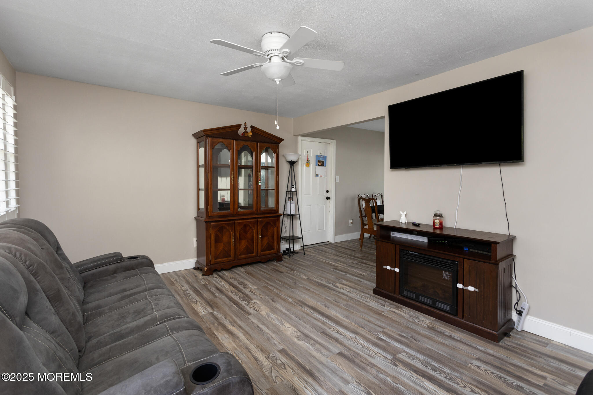 444 Pennington Drive Westampton, NJ 08060 - Photo 7 of 25 a living room with furniture and a flat screen tv