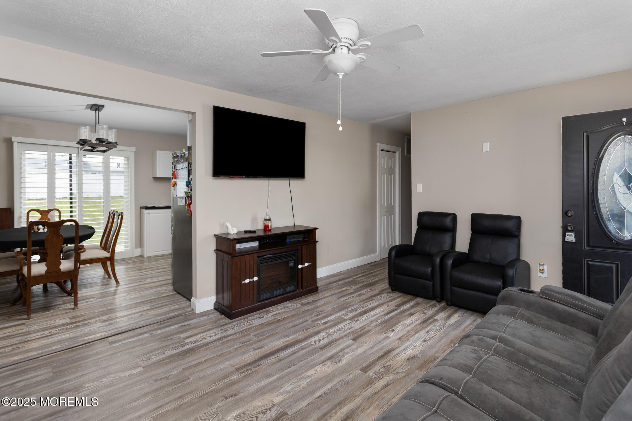 444 Pennington Drive Westampton, NJ 08060 - Photo 8 of 25 a living room with furniture and a flat screen tv