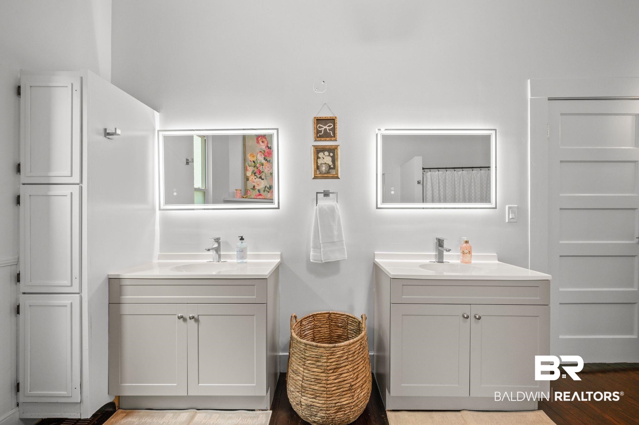 733 Pineville Road Monroeville, AL 36460 - Photo 11 of 68 Bathroom featuring wood finished floors, a sink, and two vanities