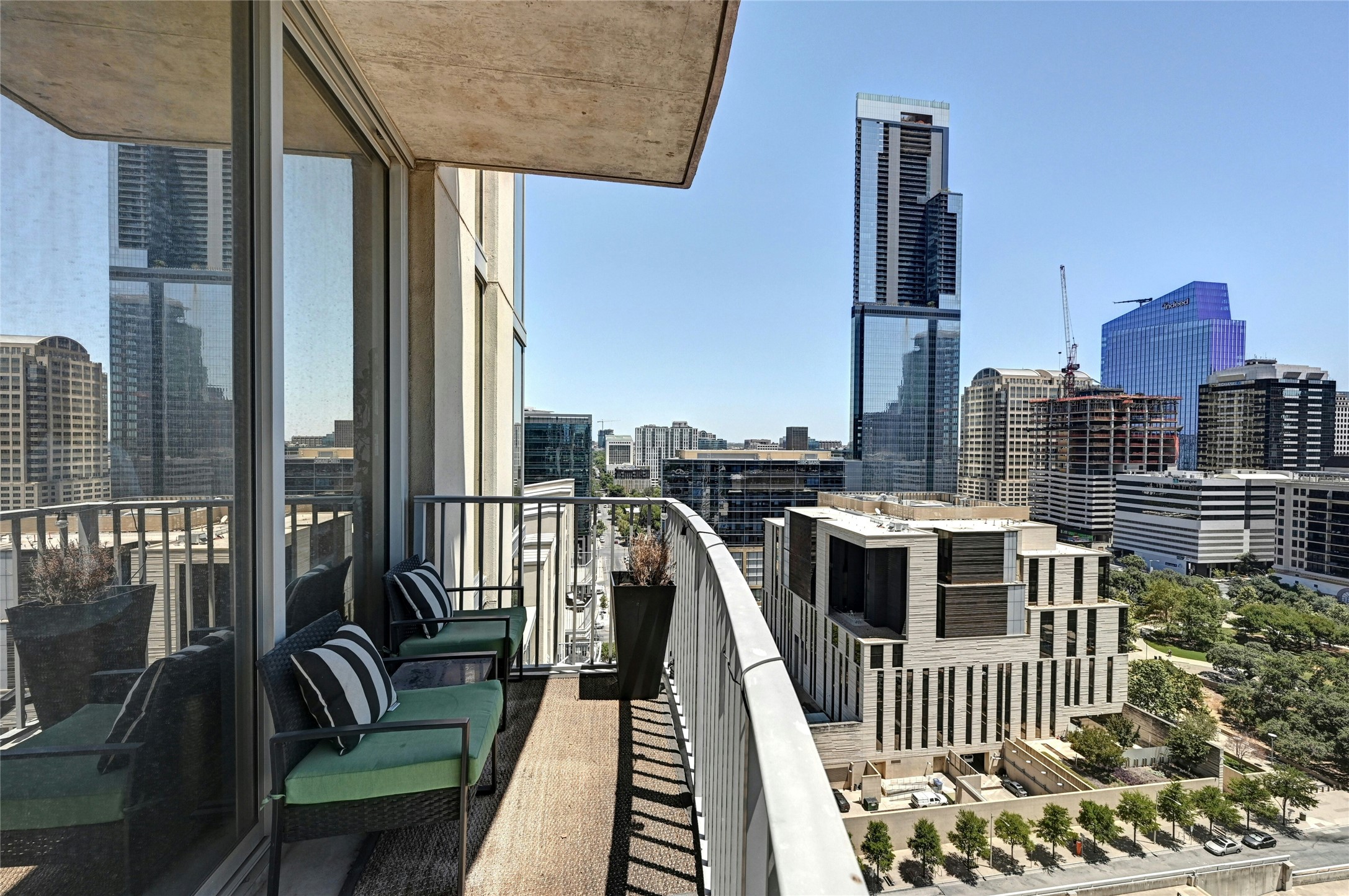 360 Nueces Street, Unit 1809 Austin, TX 78701 - Photo 24 of 25 Private balcony with a metal railing and concrete flooring