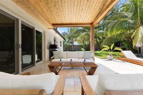 an aerial view of a house with a ocean view