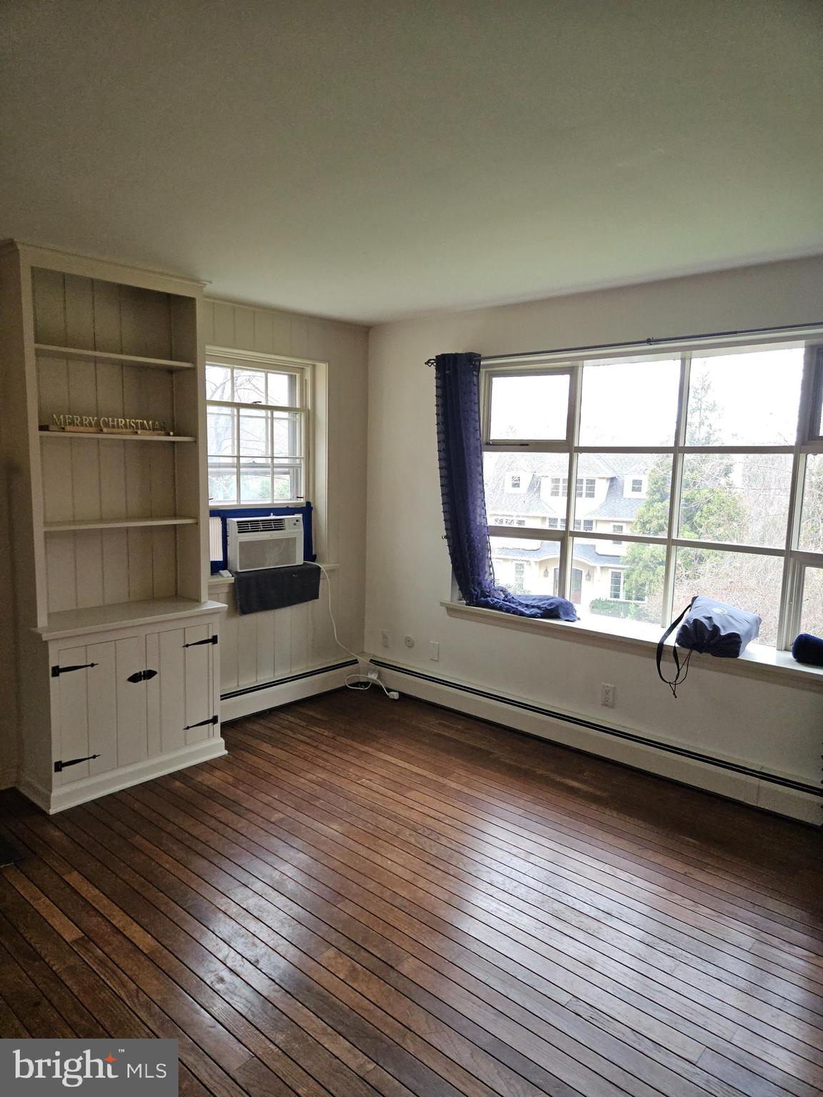 468 Lionville Station Road Chester Springs, PA 19425 - Photo 4 of 26 an empty room with wooden floor and windows