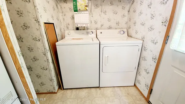 a utility room with dryer and washer
