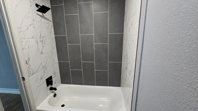 a bathroom with a bathtub