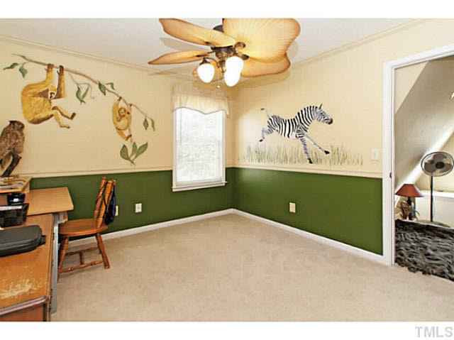 2217 Woodwyck Way Raleigh, NC 27604 - Photo 20 of 25 a workspace with a cabinet and a window
