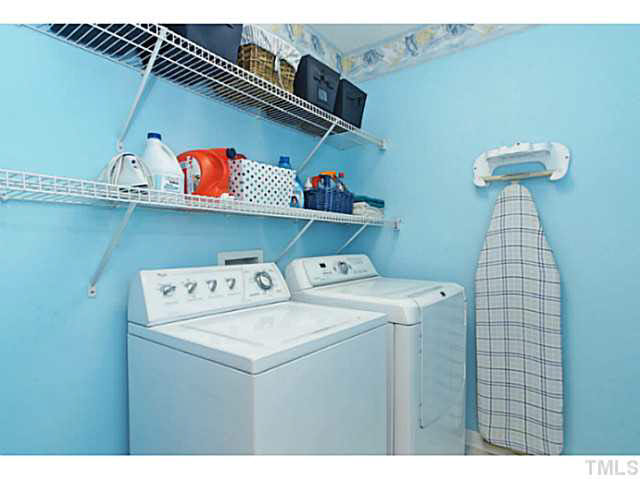 2217 Woodwyck Way Raleigh, NC 27604 - Photo 22 of 25 a utility room with dryer and washer