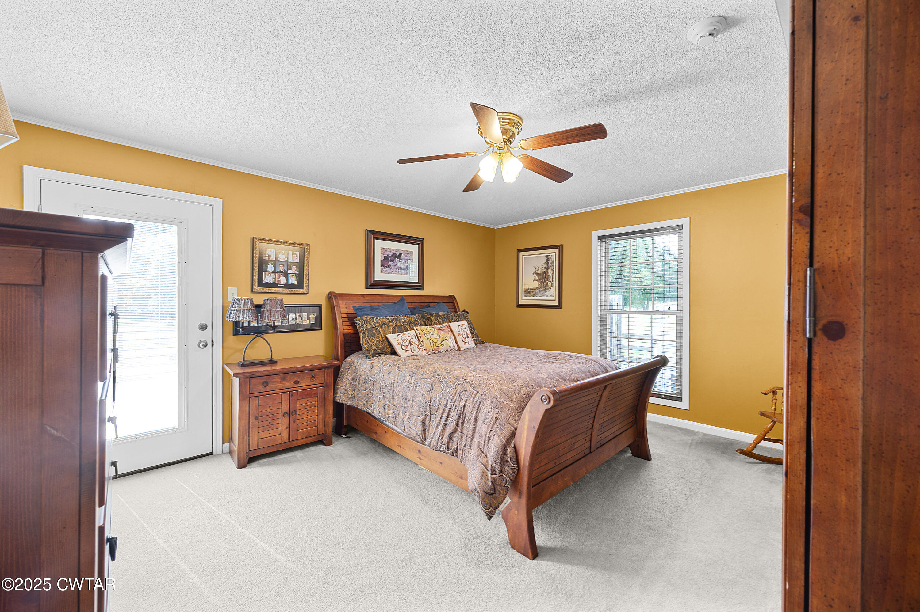 1882 Sand Ridge Bargerton Road Lexington, TN 38351 - Photo 16 of 34 a bed room with a bed and a tv