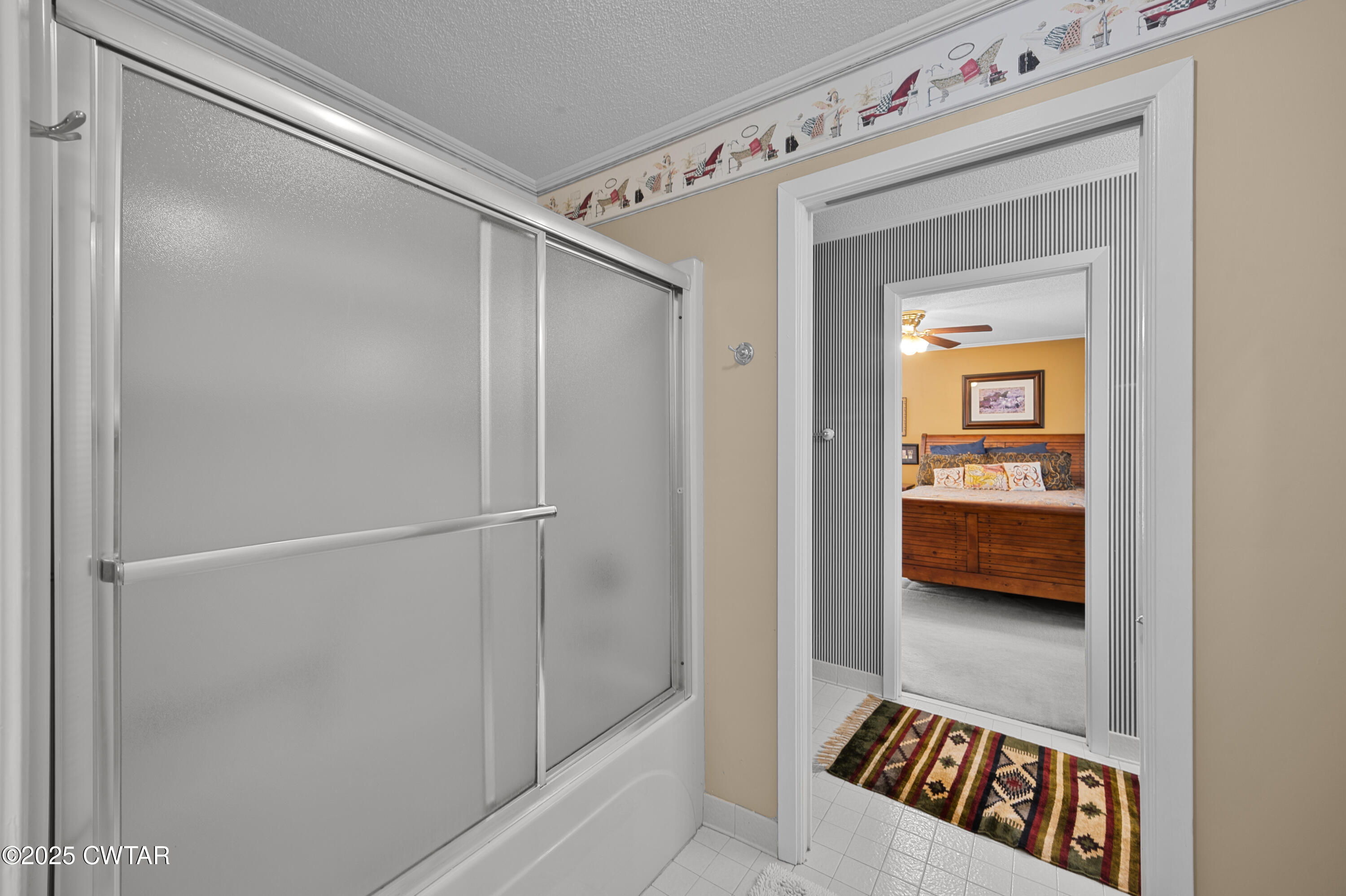 1882 Sand Ridge Bargerton Road Lexington, TN 38351 - Photo 19 of 34 a en suite bathroom with a shower and a sink