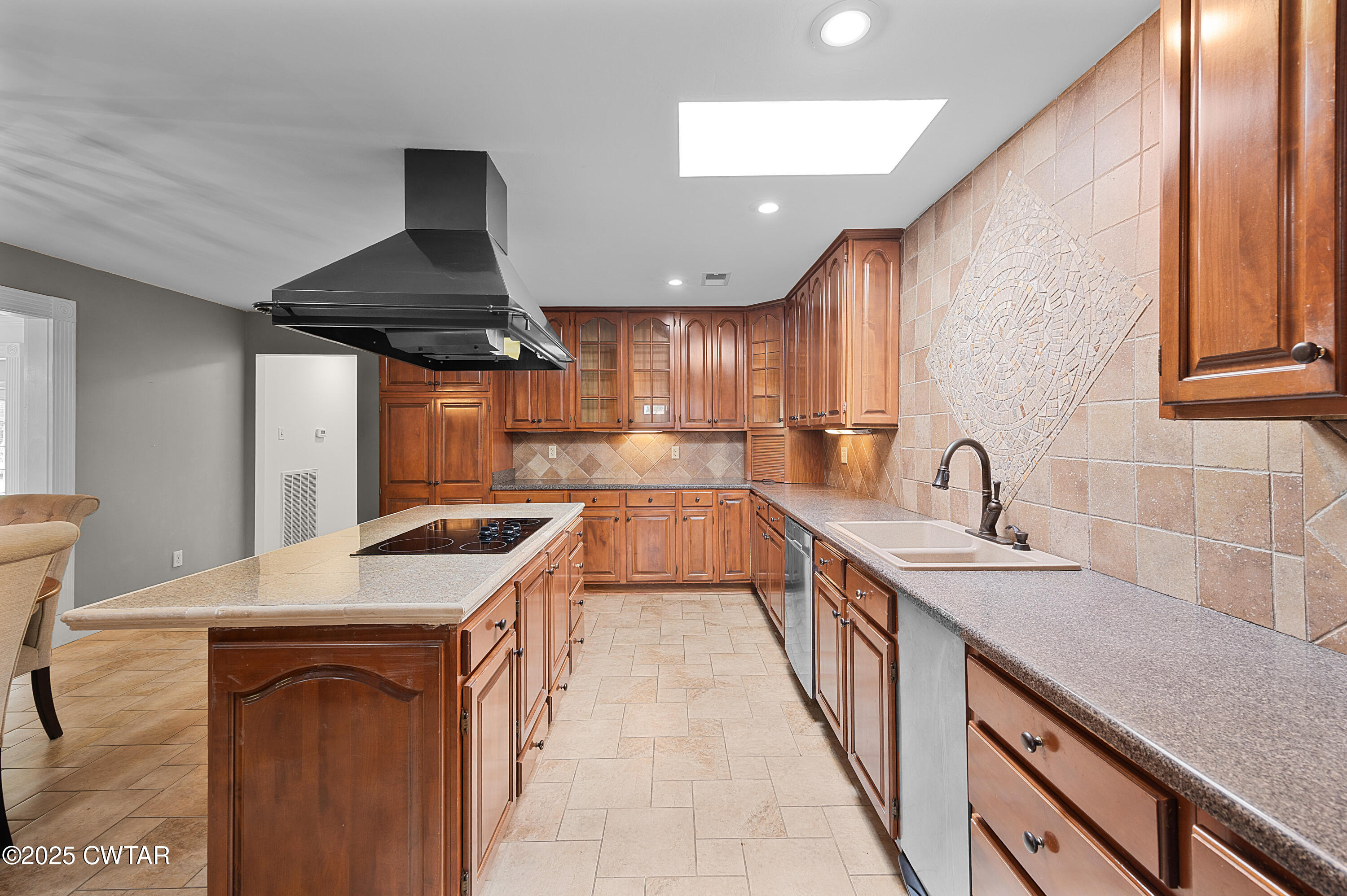 1882 Sand Ridge Bargerton Road Lexington, TN 38351 - Photo 7 of 34 a kitchen with a sink stove and cabinets