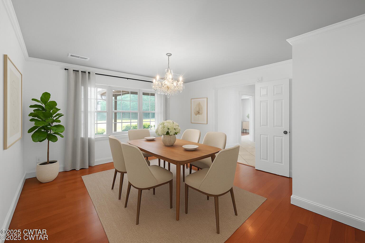 1882 Sand Ridge Bargerton Road Lexington, TN 38351 - Photo 8 of 34 a view of a dining room with furniture window and wooden floor