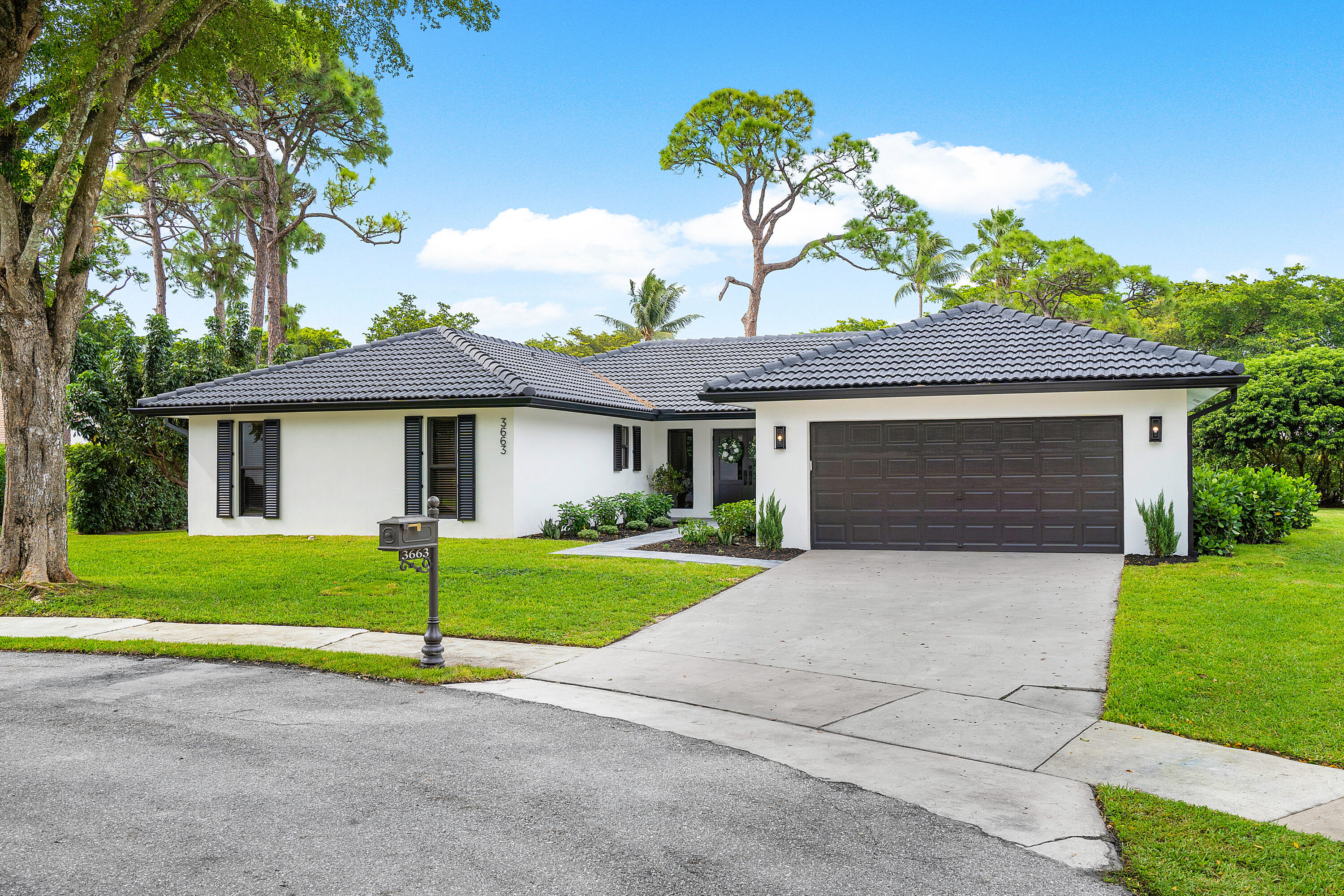 3663 Northwest 24th Way Boca Raton, FL 33431 - Photo 4 of 68 extended driveway