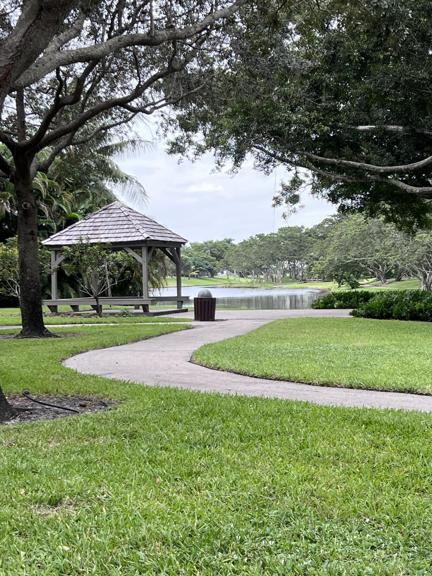 3663 Northwest 24th Way Boca Raton, FL 33431 - Photo 60 of 68 walkway