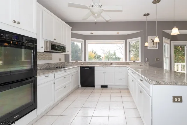 a view of a hallway with windows