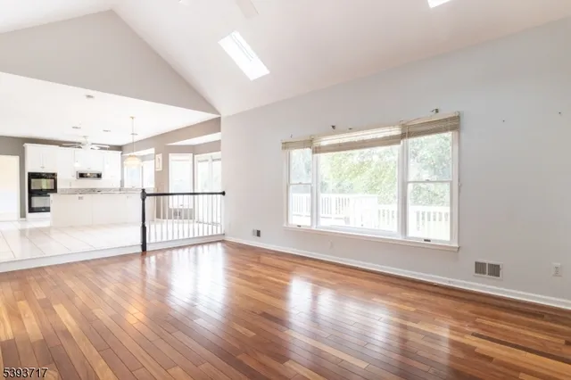 a view of a room that has a window in it