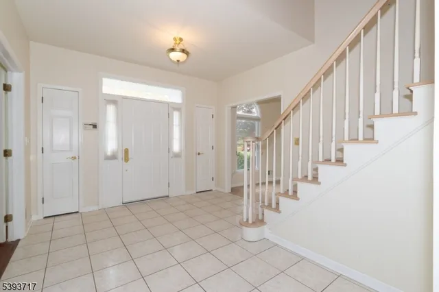 a view of an entryway with stairs