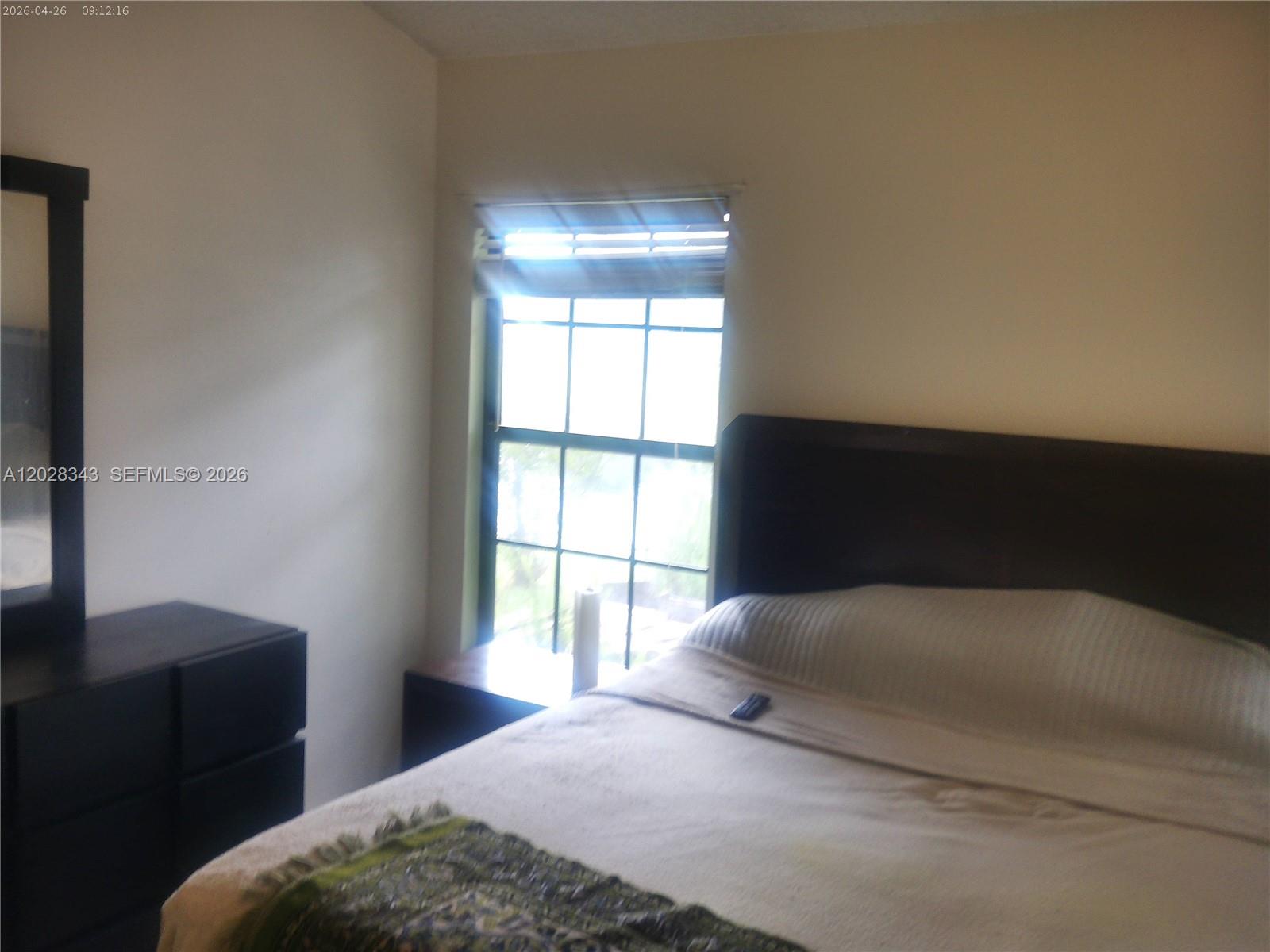 1641 Spring Oaks Lane Jacksonville, FL 32221 - Photo 30 of 44 a bedroom with a bed and a window