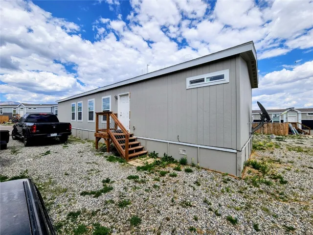 a view of a park with slide trees