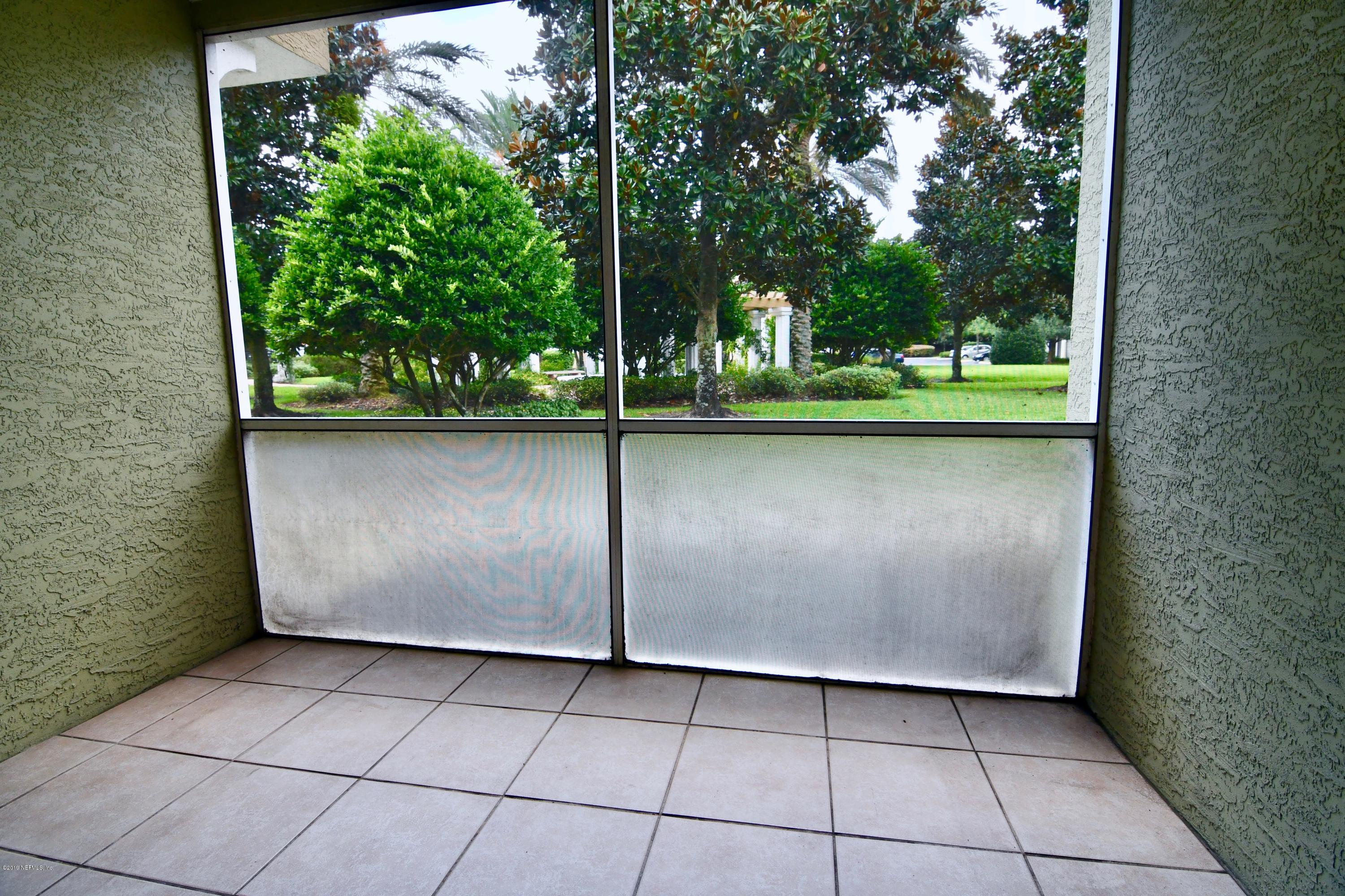 10075 Gate Parkway North, Unit 604 Jacksonville, FL 32246 - Photo 13 of 35 a view of a back yard from a space