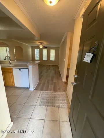 a view of a kitchen with a sink