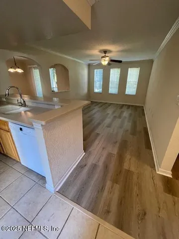 a view of living room with wooden floor