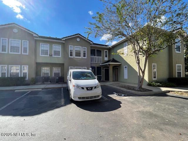 10075 Gate Parkway North, Unit 604 Jacksonville, FL 32246 - Photo 27 of 35 a car parked in front of a house
