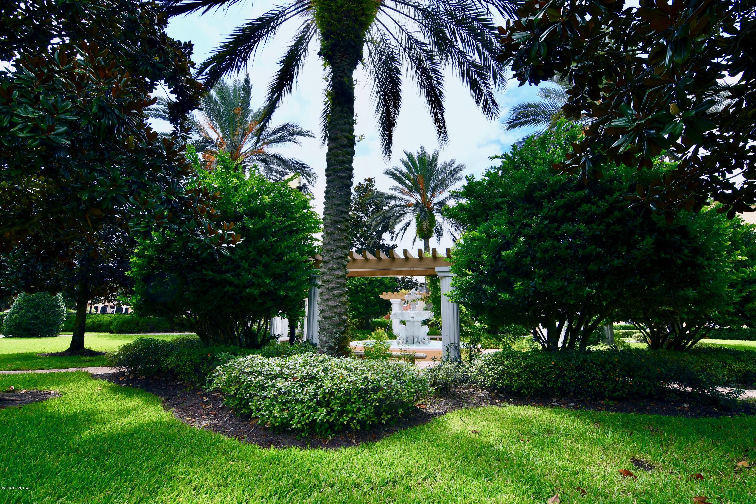10075 Gate Parkway North, Unit 604 Jacksonville, FL 32246 - Photo 33 of 35 a front view of a house with a garden