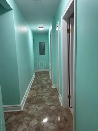 a view of a hallway with a elevator