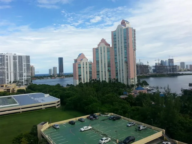 a view of a city with tall buildings