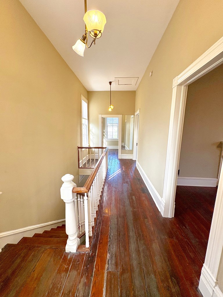 110 7th Street Columbus, GA 31901 - Photo 24 of 24 a view of a livingroom with furniture wooden floor and front door
