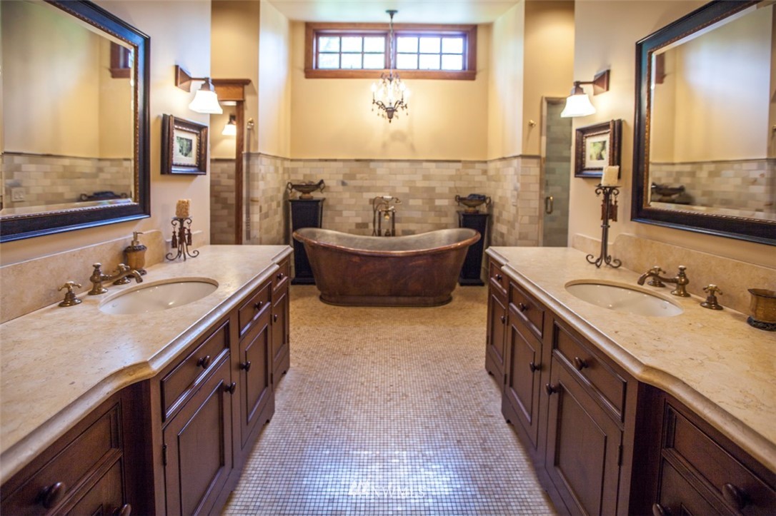 776 H Street Road Lynden, WA 98264 - Photo 20 of 25 a bathroom with a granite countertop sink mirror and a bathtub