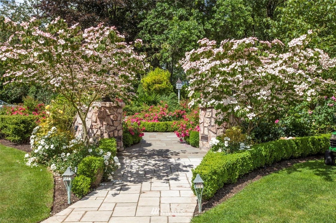 776 H Street Road Lynden, WA 98264 - Photo 4 of 25 a view of a pathway both side of yard