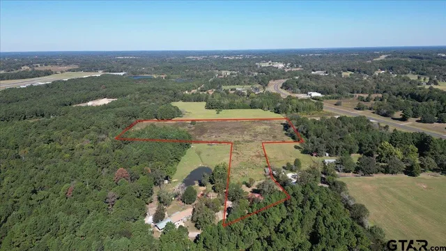 an aerial view of residential house with outdoor space