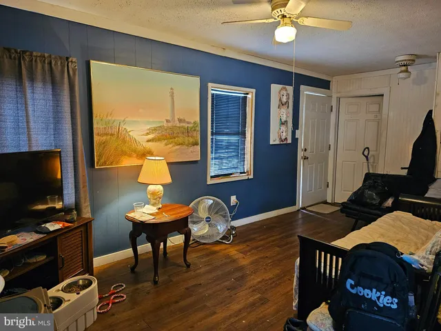 a workspace with furniture and a flat screen tv