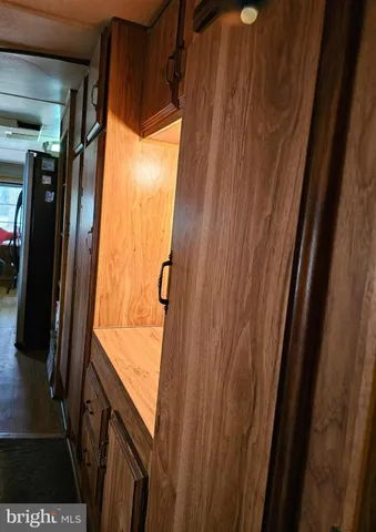 a front view of a house with outdoor seating