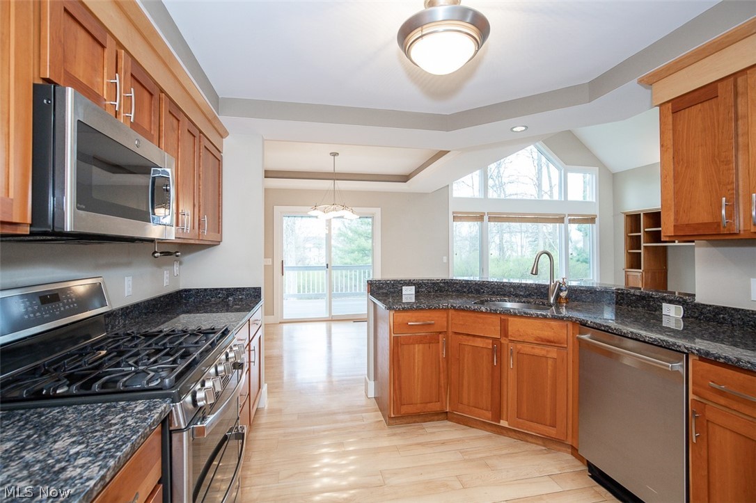 7282 Holzhauer Road Northfield, OH 44067 - Photo 12 of 47 Kitchen open to dining and living rooms