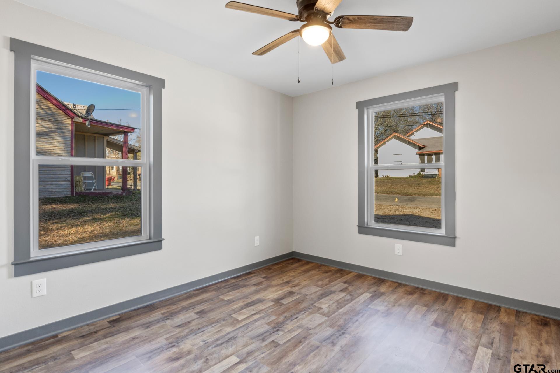 109 Yates Street Mount Vernon, TX 75457 - Photo 13 of 23 a view of an empty room with window and closet