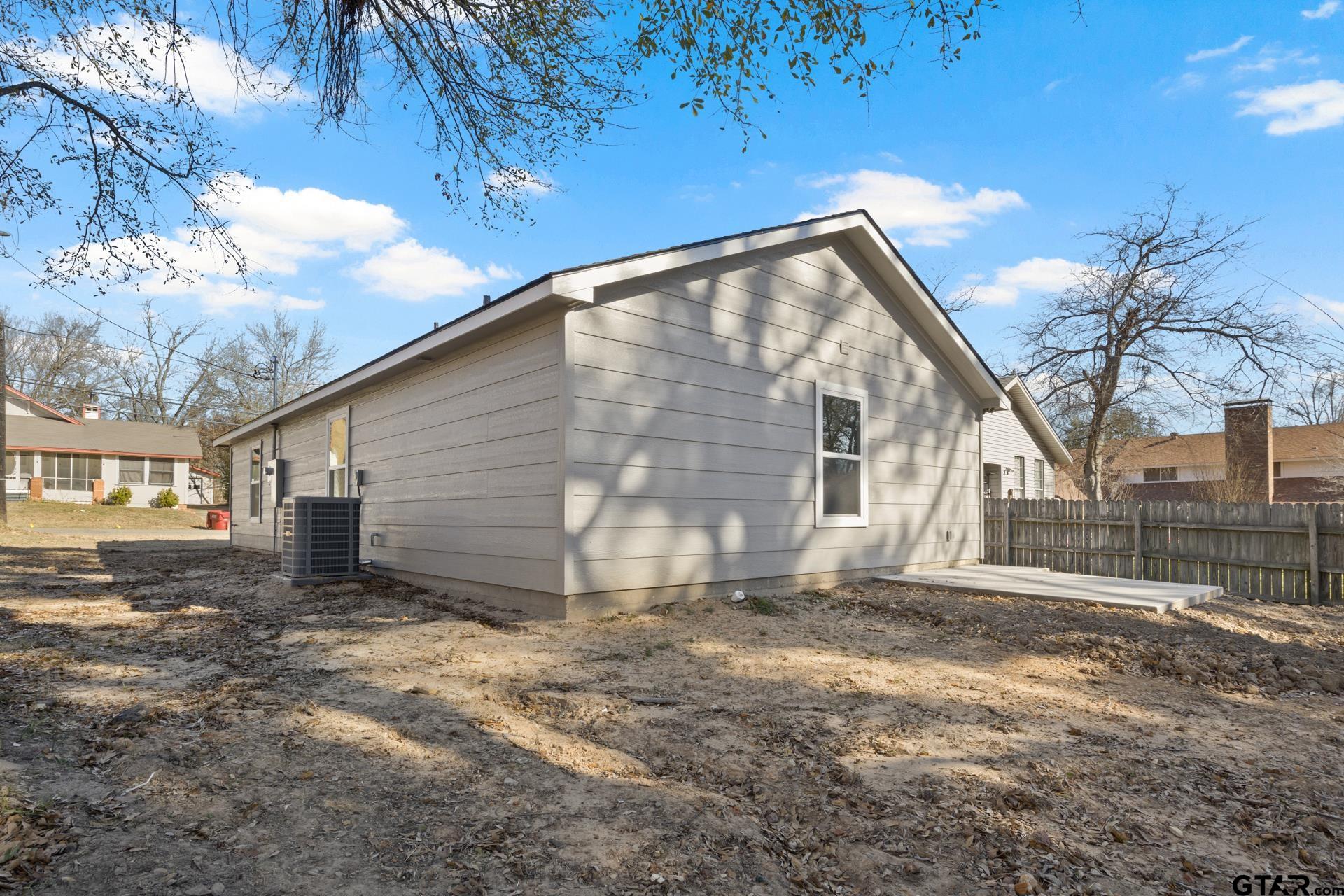 109 Yates Street Mount Vernon, TX 75457 - Photo 21 of 23 a backyard of a house