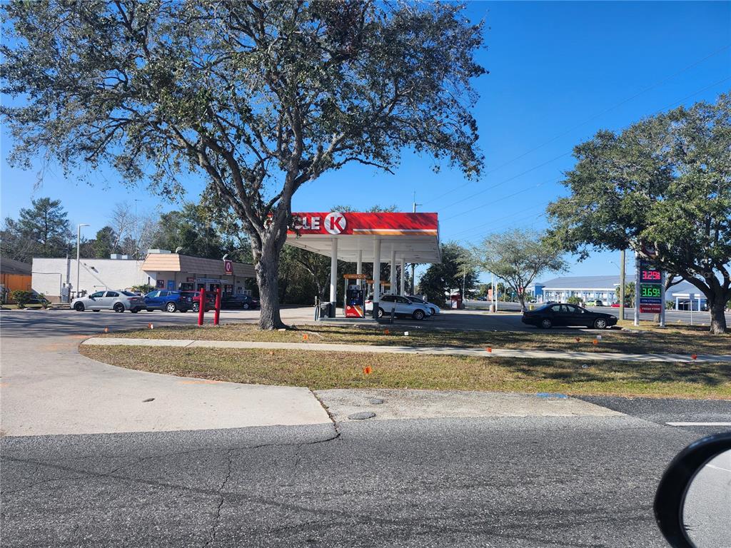 6141 Freeport Drive Spring Hill, FL 34606 - Photo 23 of 28 a view of a swimming pool with sitting area