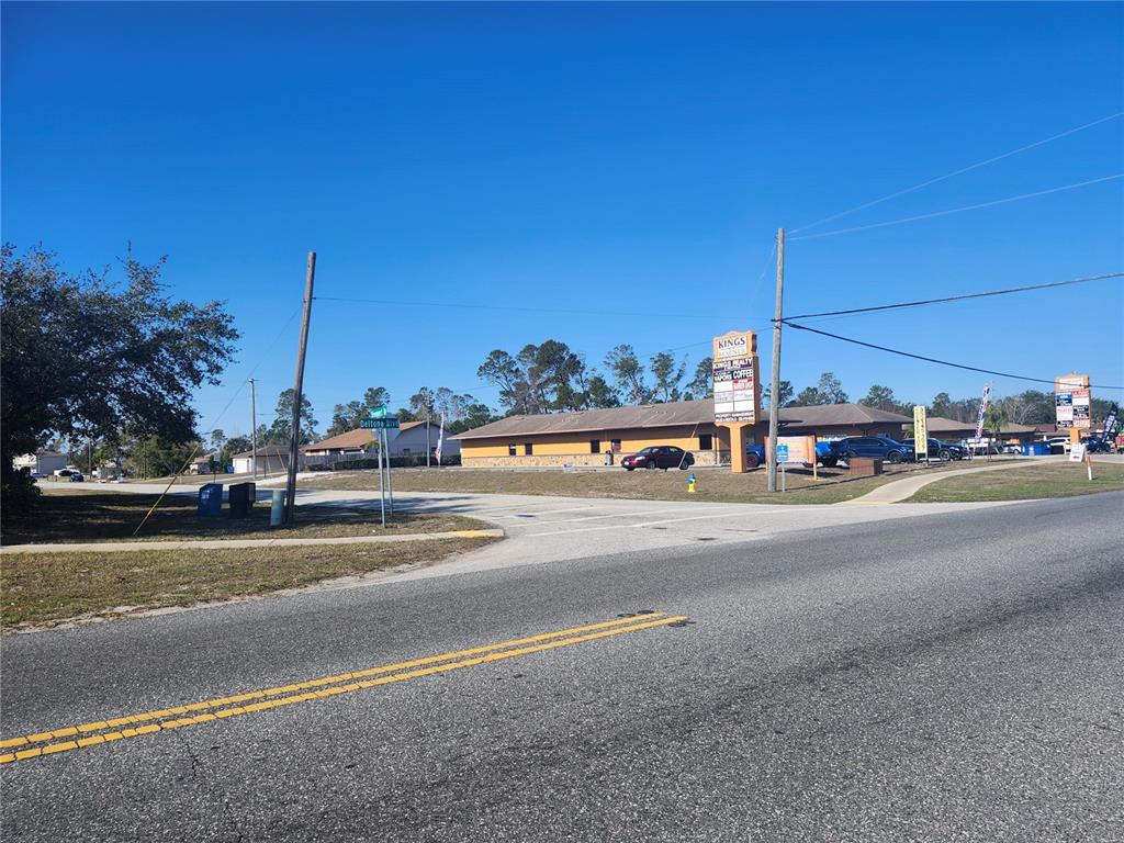 6141 Freeport Drive Spring Hill, FL 34606 - Photo 25 of 28 a view of a street with cars on road