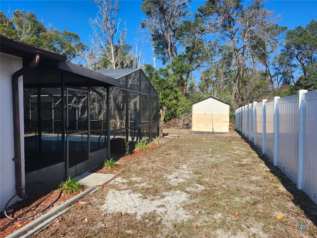 6141 Freeport Drive Spring Hill, FL 34606 - Photo 27 of 28 a view of a backyard