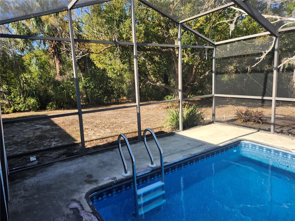 6141 Freeport Drive Spring Hill, FL 34606 - Photo 5 of 28 a view of a balcony with yard