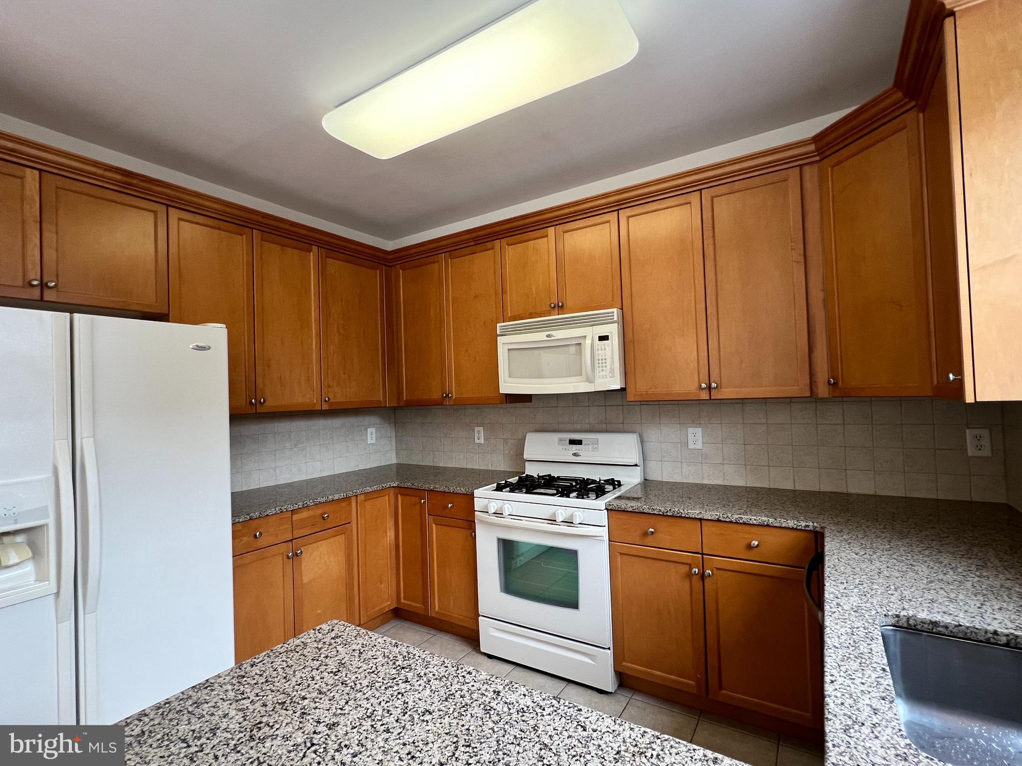 422 Masterson Court Ewing, NJ 08618 - Photo 13 of 29 a kitchen with stainless steel appliances granite countertop a stove a sink dishwasher and a refrigerator