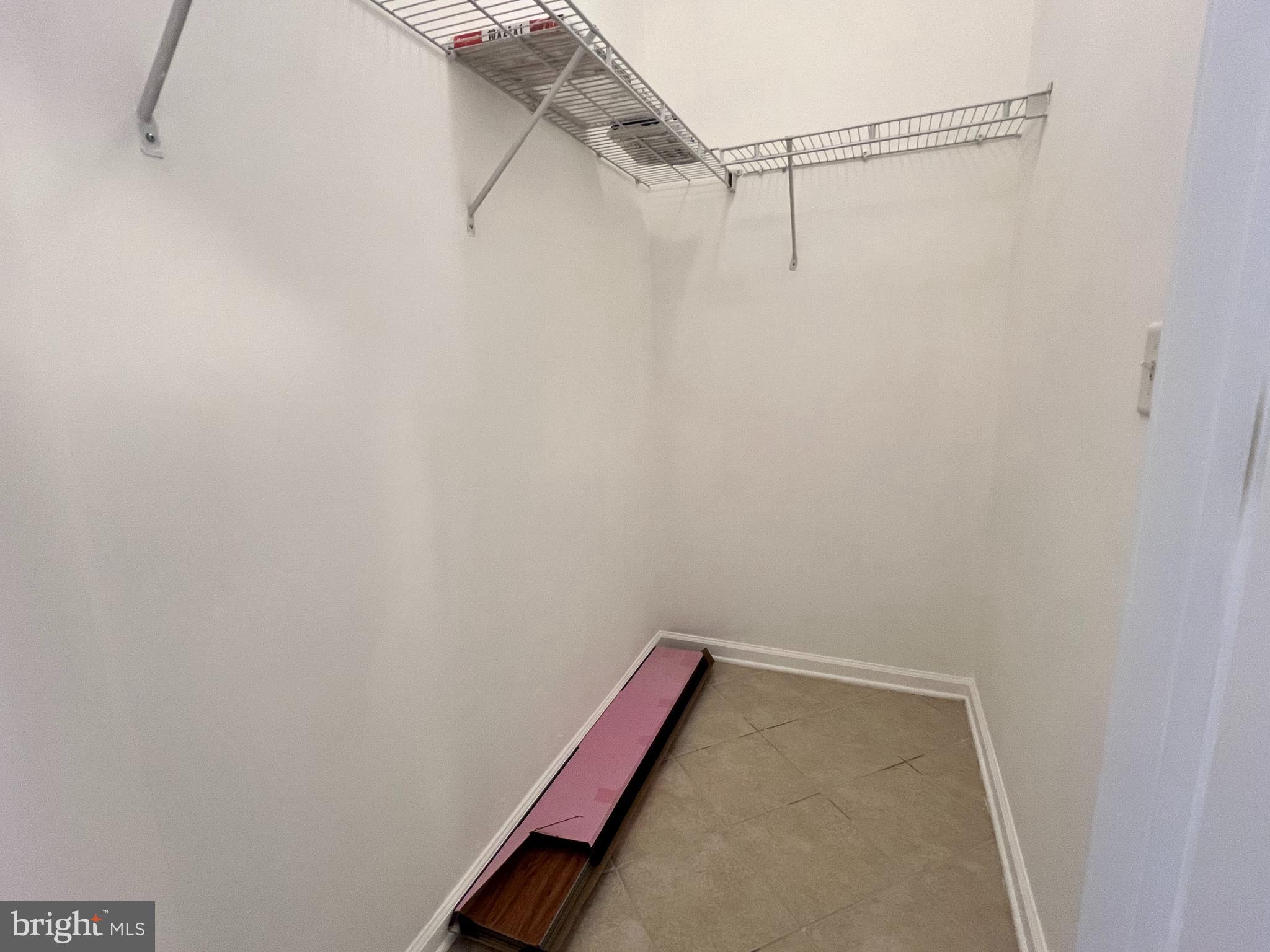 422 Masterson Court Ewing, NJ 08618 - Photo 24 of 29 a view of a room with racks on the wall