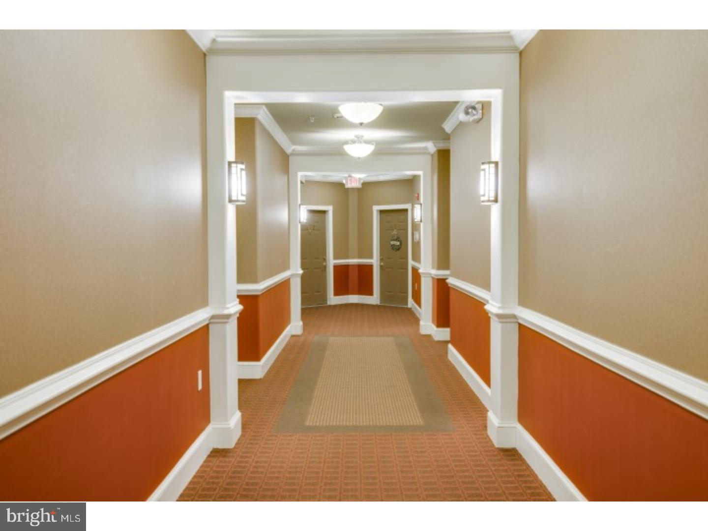 422 Masterson Court Ewing, NJ 08618 - Photo 5 of 29 a hallway with wooden floor in a house