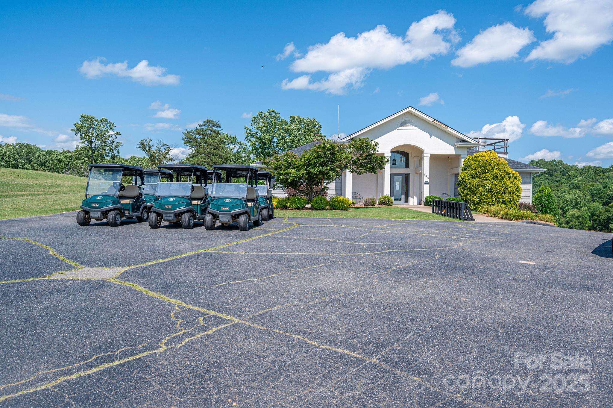 Lot #49 Moss Drive Rutherfordton, NC 28139 - Photo 22 of 24 a front view of a house with a yard and garage